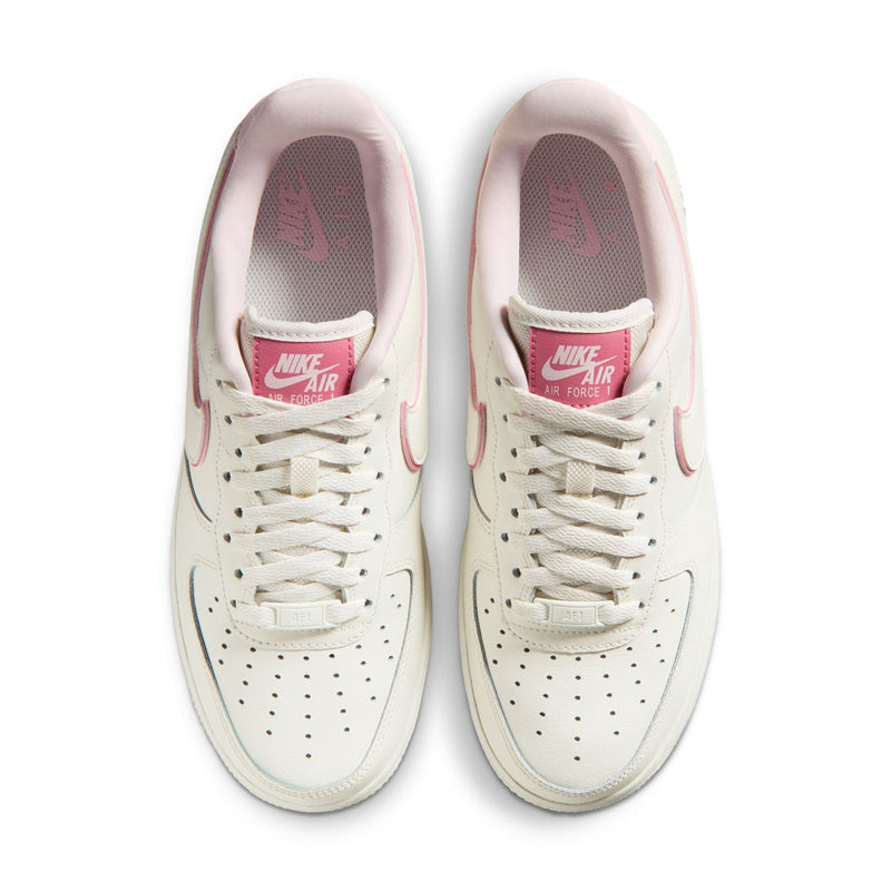 Womens Nike Air Force 1 sneakers, sail white uppers with pink Nike Air tongue branding