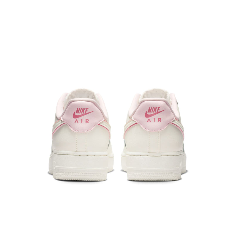 Womens Nike Air Force 1 sneakers, sail white with pink heel tabs and Nike Air branding