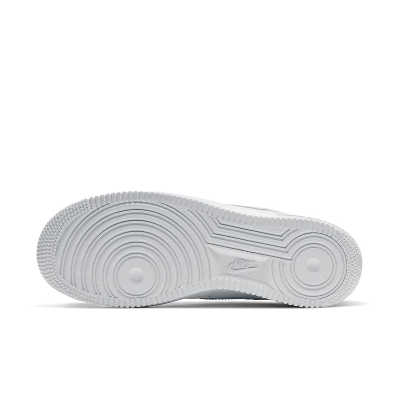 White rubber sneaker outsole with circular traction pattern and Air logo