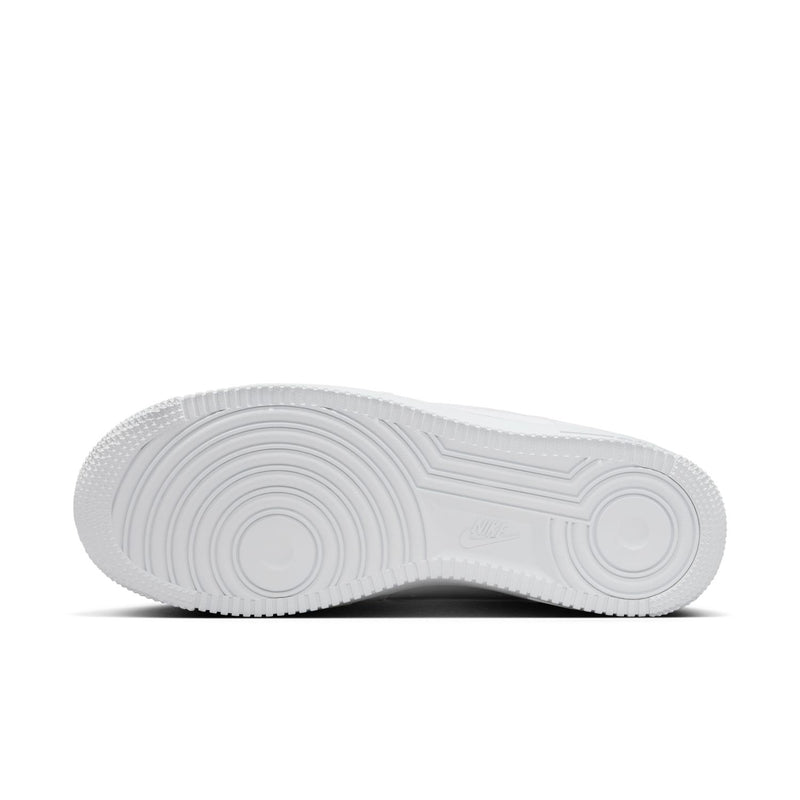 Women's Nike white sneaker outsole with circular traction tread pattern
