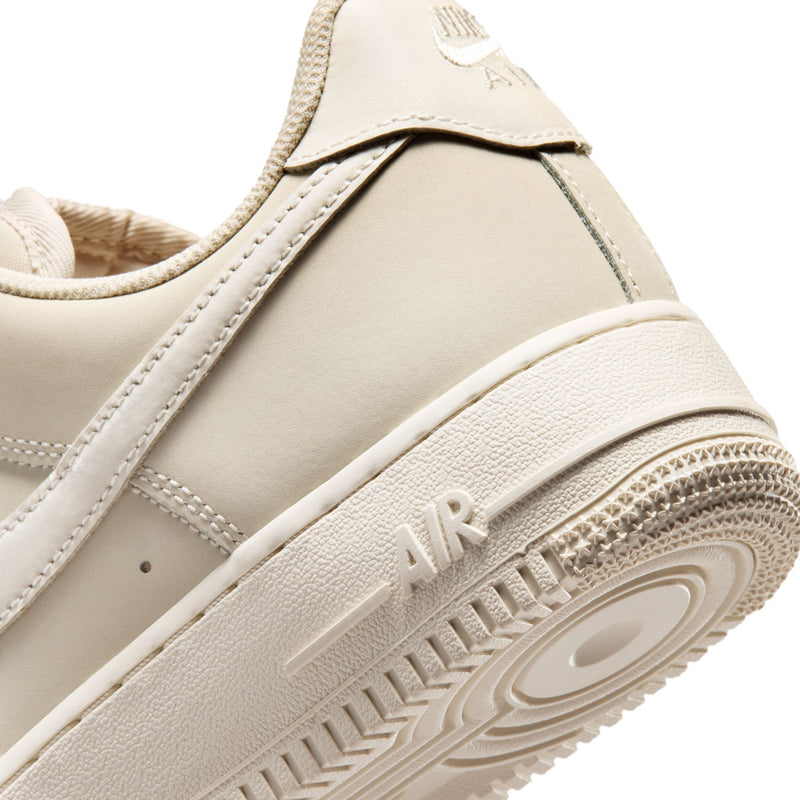 Women's Nike Air Force 1 midsole and toe area, light oatmeal with stitched details
