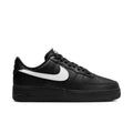 Nike Air Force 1 Low black leather sneaker with white swoosh and black laces