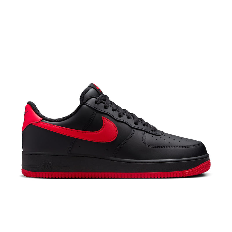 Men's black/red low-top Nike sneakers with red swoosh and black laces