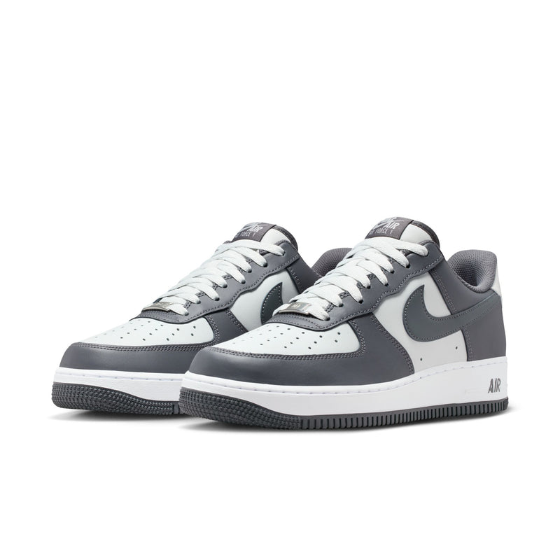Pair of men's low-top sneakers, dark grey and white, with lace-up design
