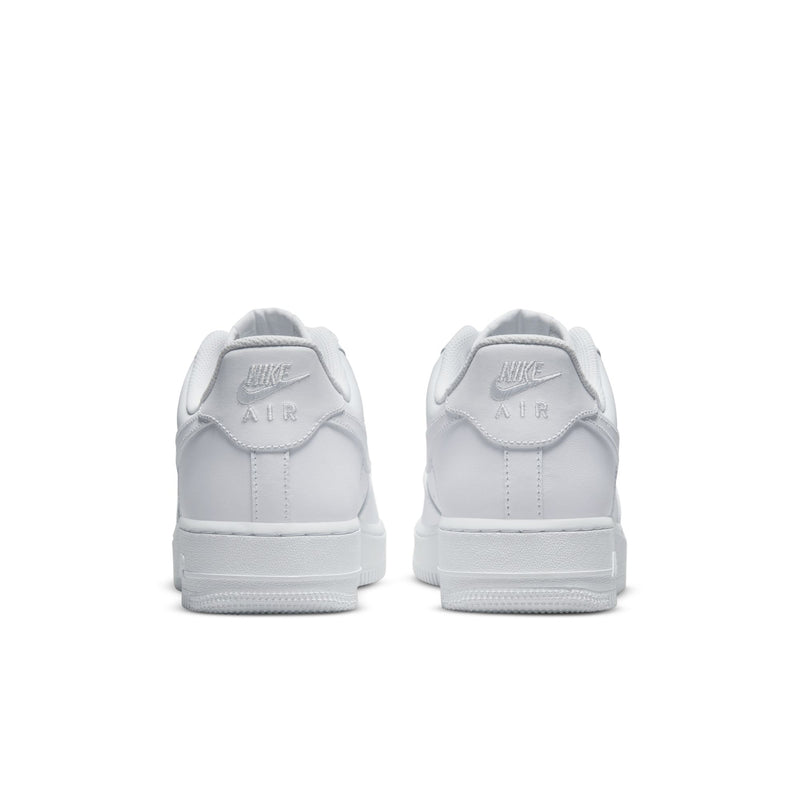 White sneakers from the heel with Nike Air branding on the back tab