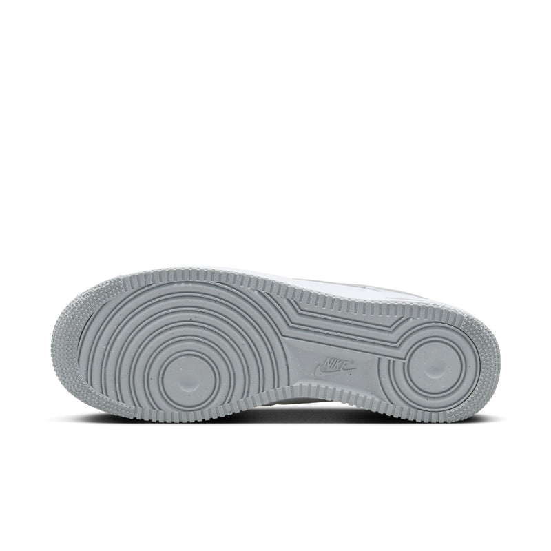 Men's sneaker outsole in light gray with circular traction pattern