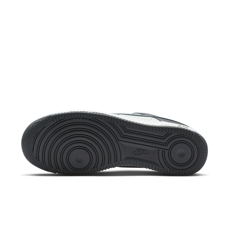 Men's sneaker outsole view with dark tread and white midsole edge