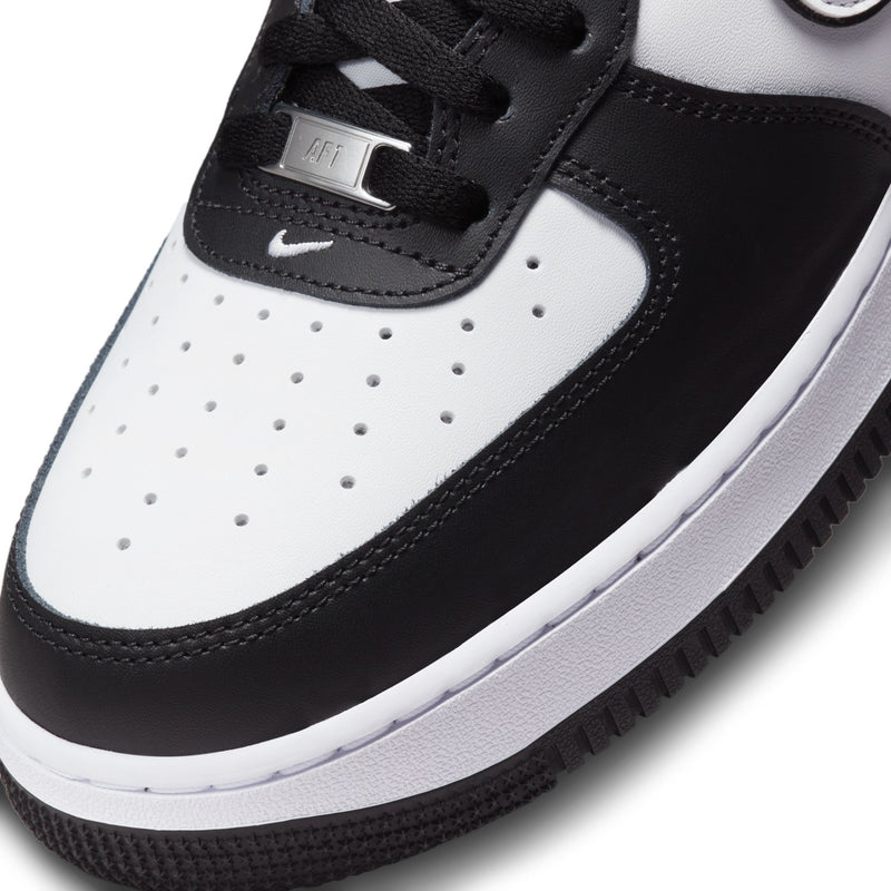 Nike Air Force 1 Low white and black leather upper with lace keeper and perforations