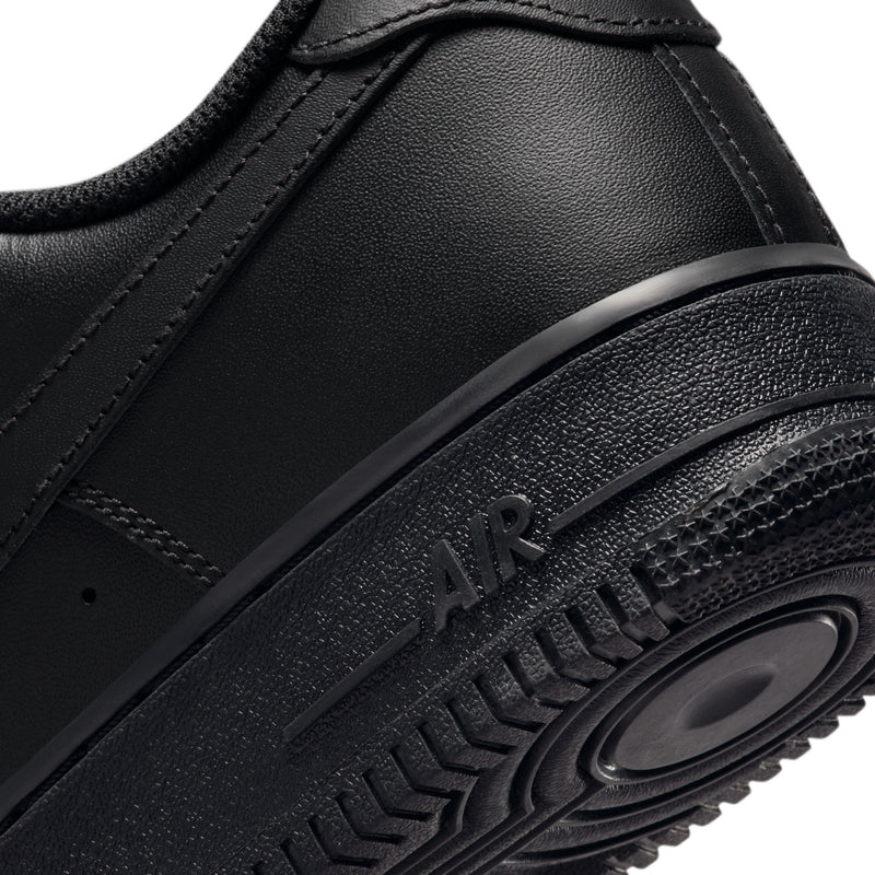 Close-up of black midsole with embossed AIR text and textured rubber trim
