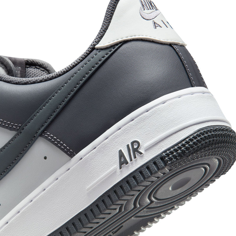 Men's sneaker midsole close-up showing AIR text and textured outsole detail