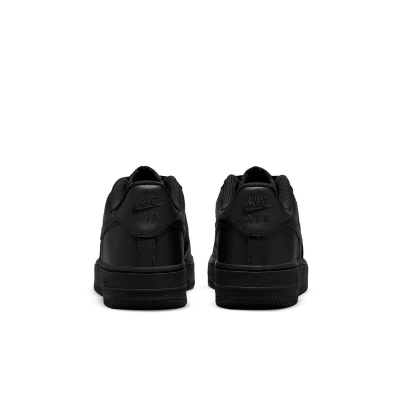 Black youth low-top sneakers with cushioned heel tabs; rear view