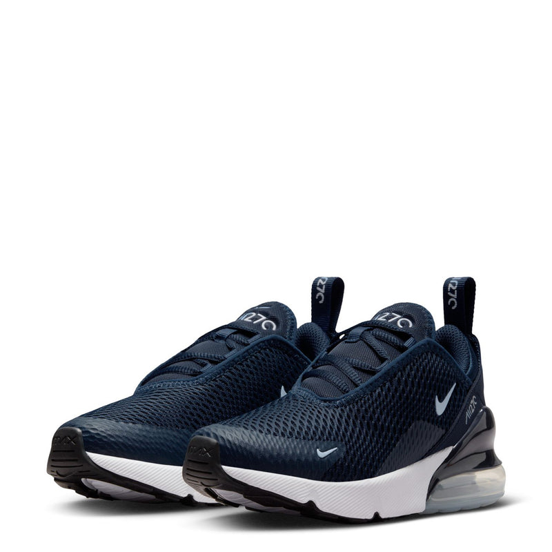 Kids Nike running sneaker, front view in navy knit with white midsole and laces