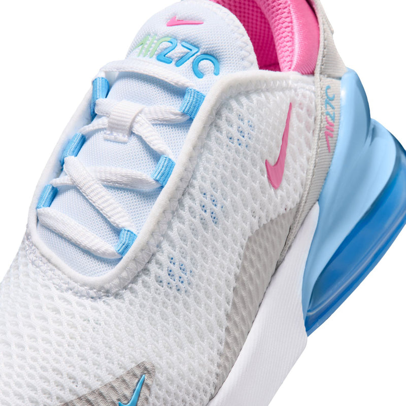 Kids white mesh sneaker upper close-up with pink swoosh and blue lace panels