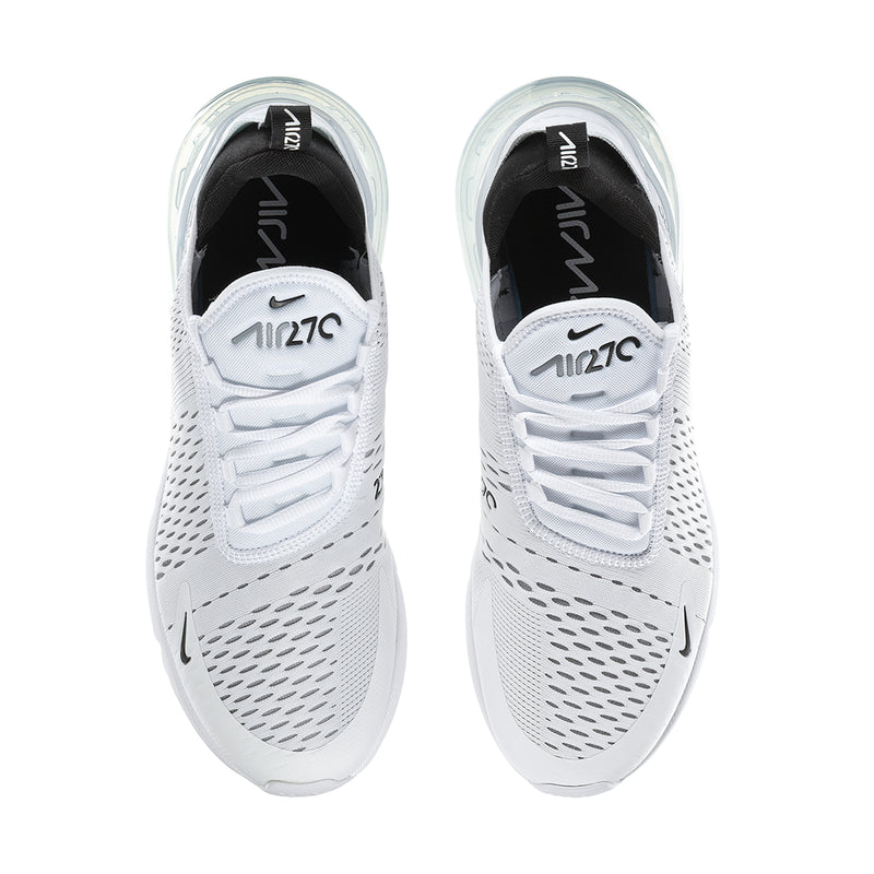 Pair of white low-top sneakers with perforated panels, black interior, and laces