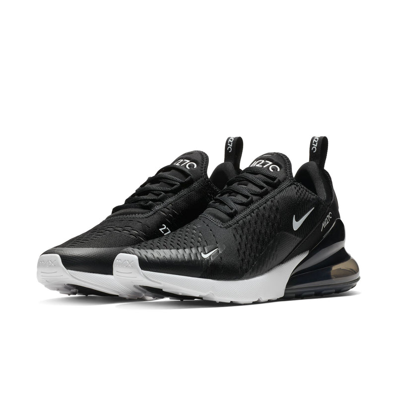 Women’s black running sneaker, angled side view with swoosh and white midsole
