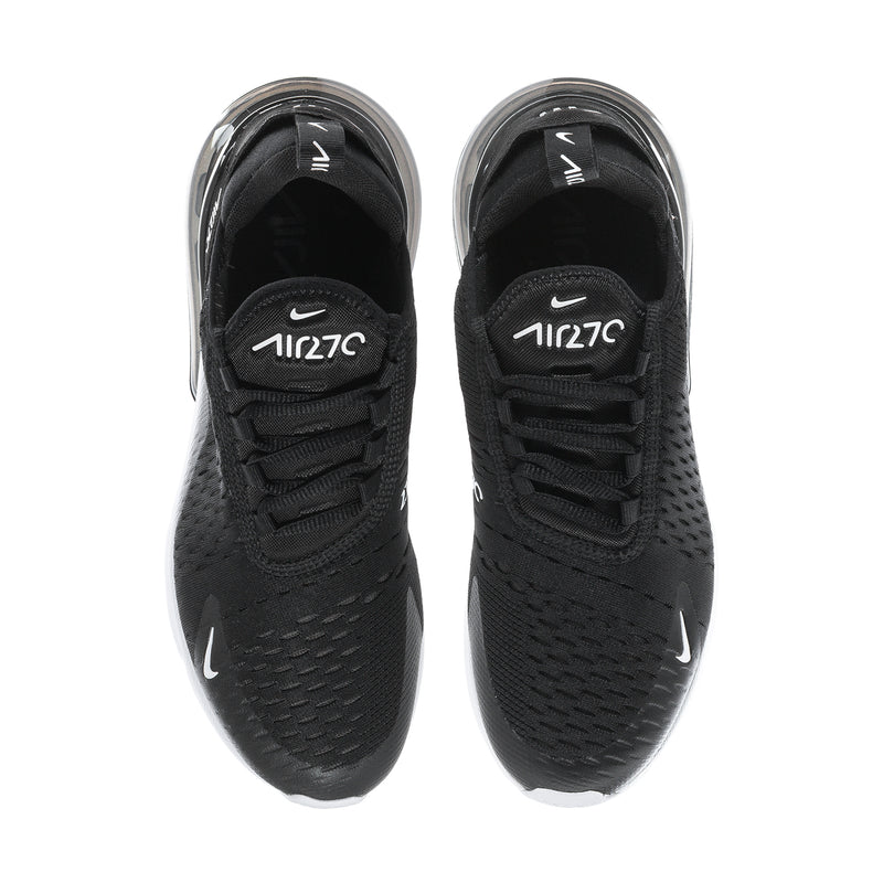 Pair of black sneakers viewed from above, with lace-ups and swoosh logos