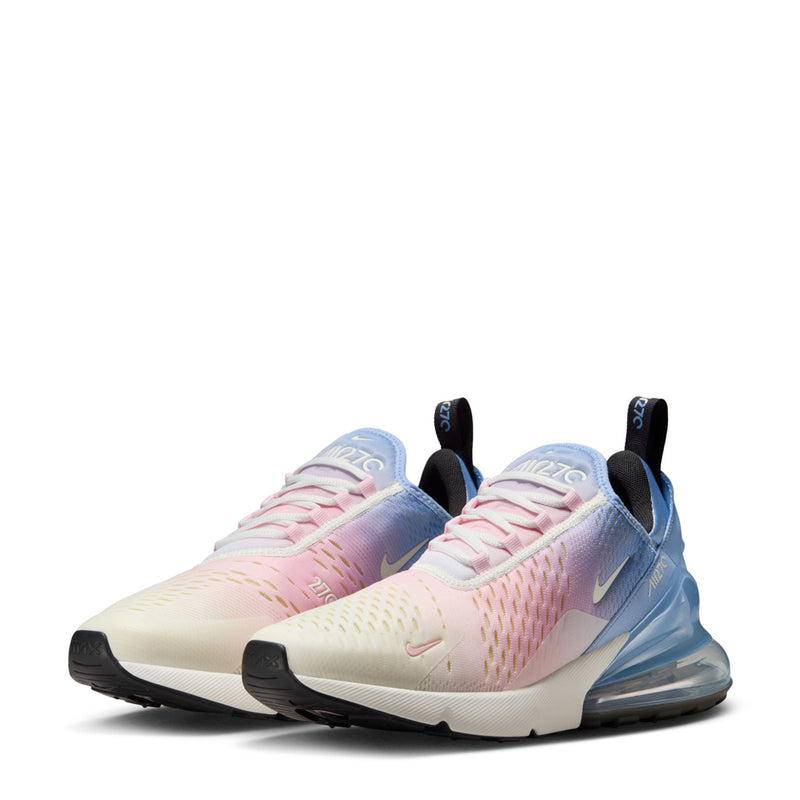 Pair of low-top sneakers with pink-and-blue knit upper and swoosh accents