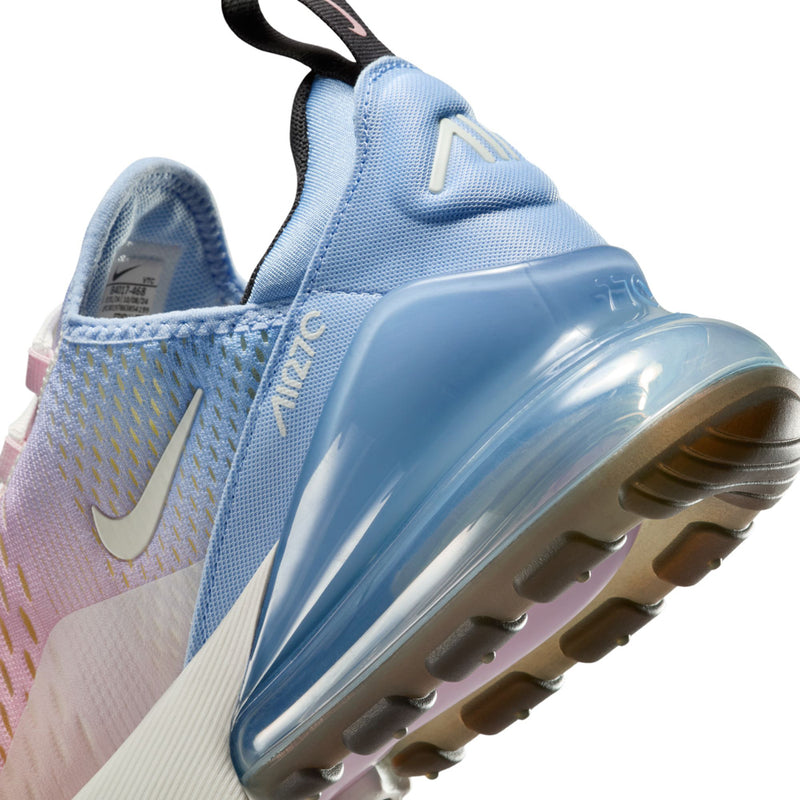 Close-up of light-blue heel air unit and rubber outsole on pink upper