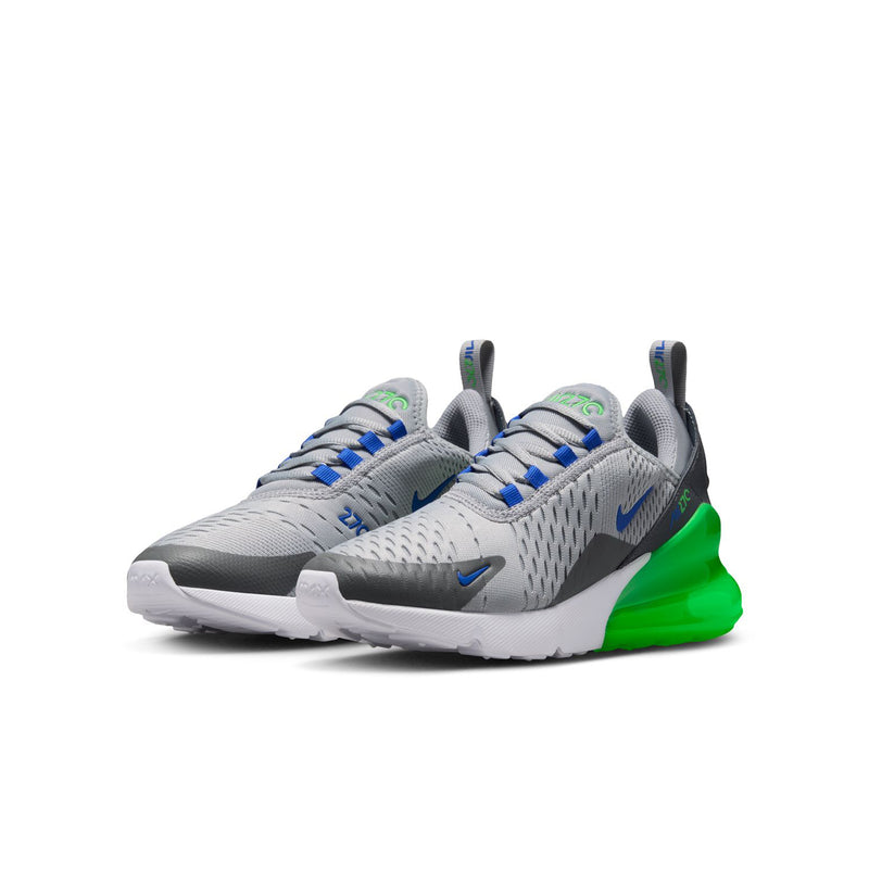 Youth sneakers, light gray mesh with blue accents, dark heel, and bright green cushioning