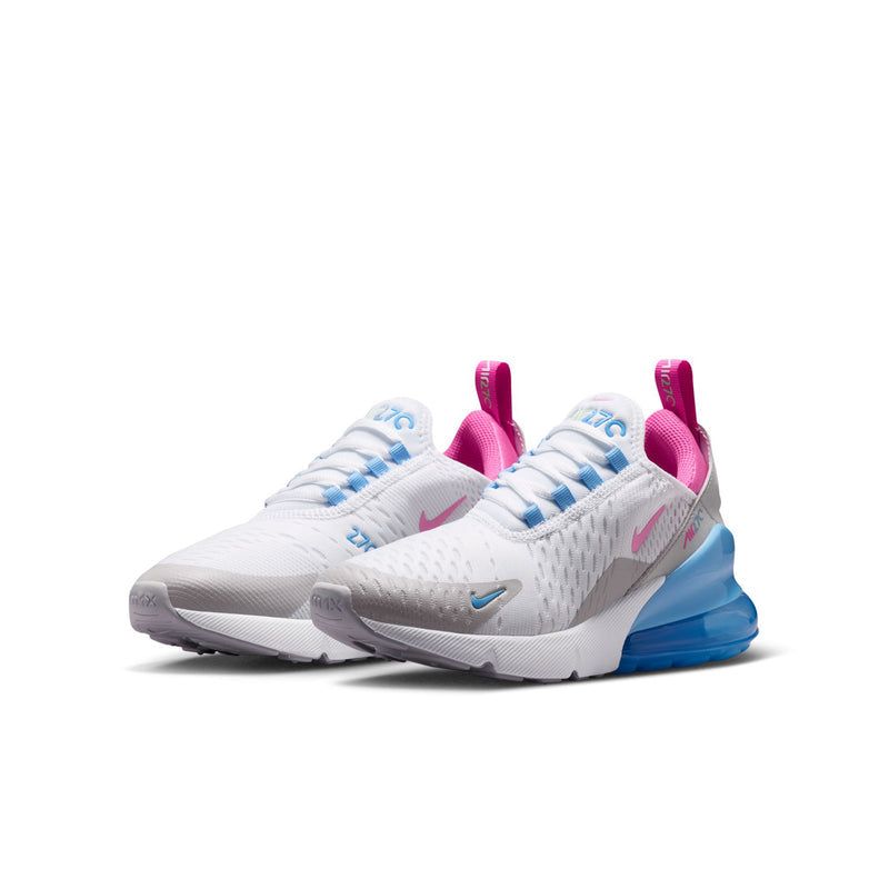 Youth running sneakers with white knit upper, pink tongue pull, and blue cushioned sole