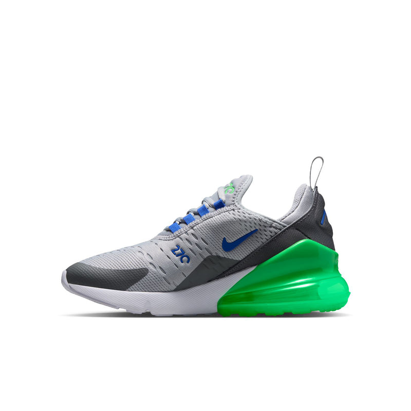 Youth sneakers in light gray with blue laces, green heel pod, and lace pull tab