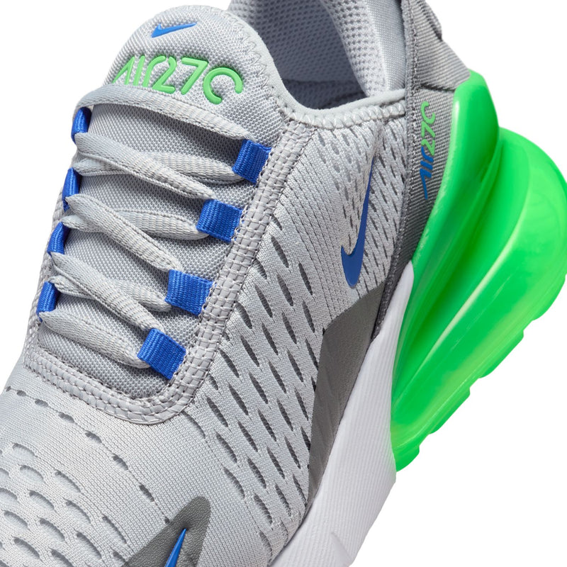 Close-up: light gray textured knit with blue laces, Nike swoosh, and green Air unit