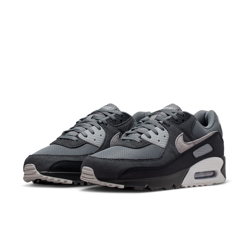 Men's Nike Air Max 90 sneakers pair, lace-up front three-quarter view, air-cushion sole
