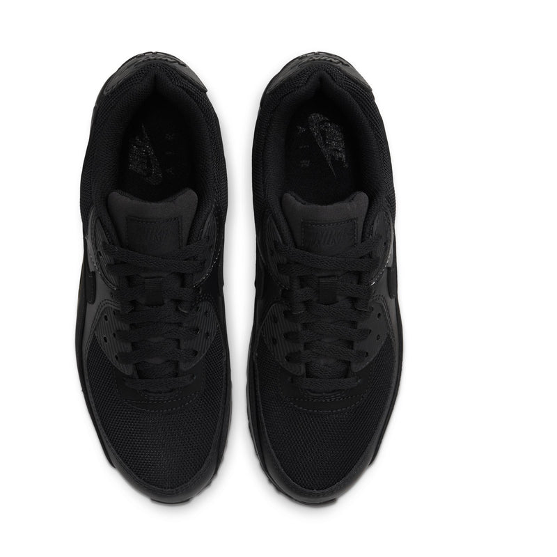 Pair of black Nike sneakers shown from above with lace-up uppers and padded tongues