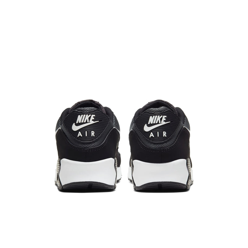 Air Max 90 sneakers with black heels, white midsole, and NIKE AIR back print