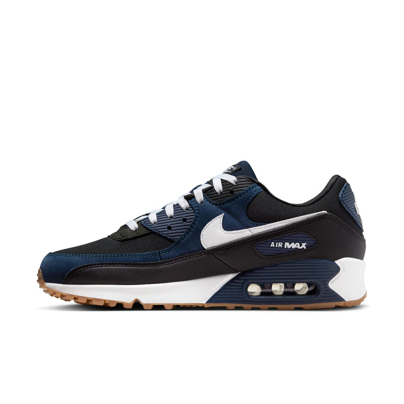 Men's Nike Air Max 90 sneaker, side profile in blue/black with white swoosh and Air unit