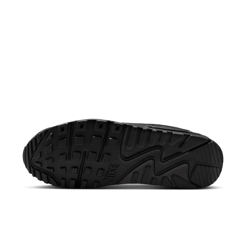 Black rubber outsole with tread pattern for traction on sneakers
