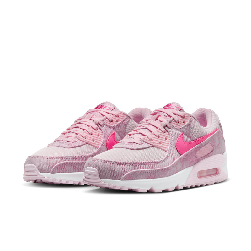 Pair of pink Air Max 90-style sneakers with lace-up design and white cushioned outsole