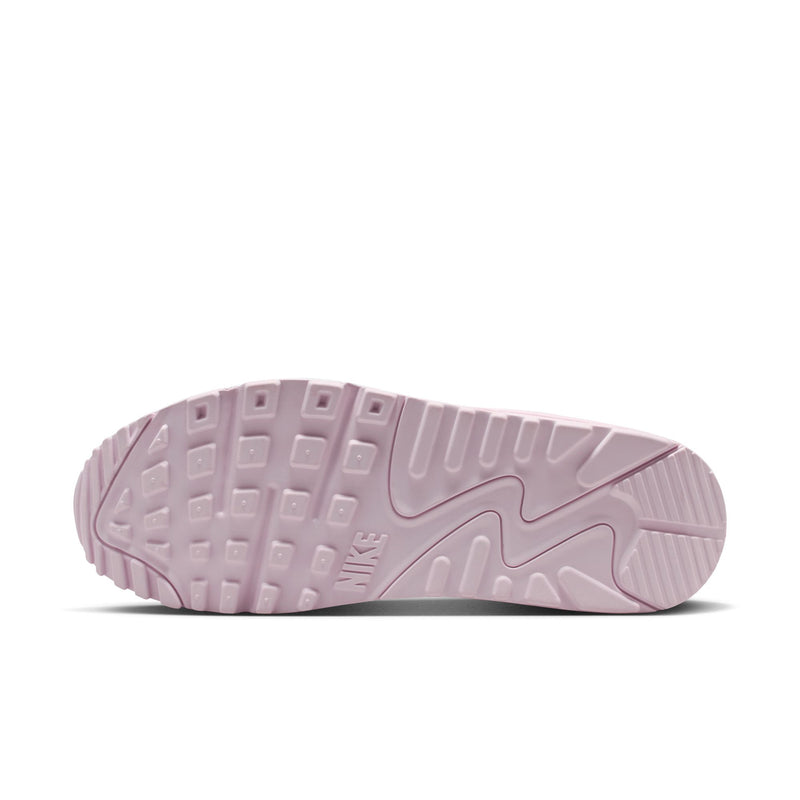 Bottom view of pink Air Max 90-style sneaker outsole with tread and Nike logo