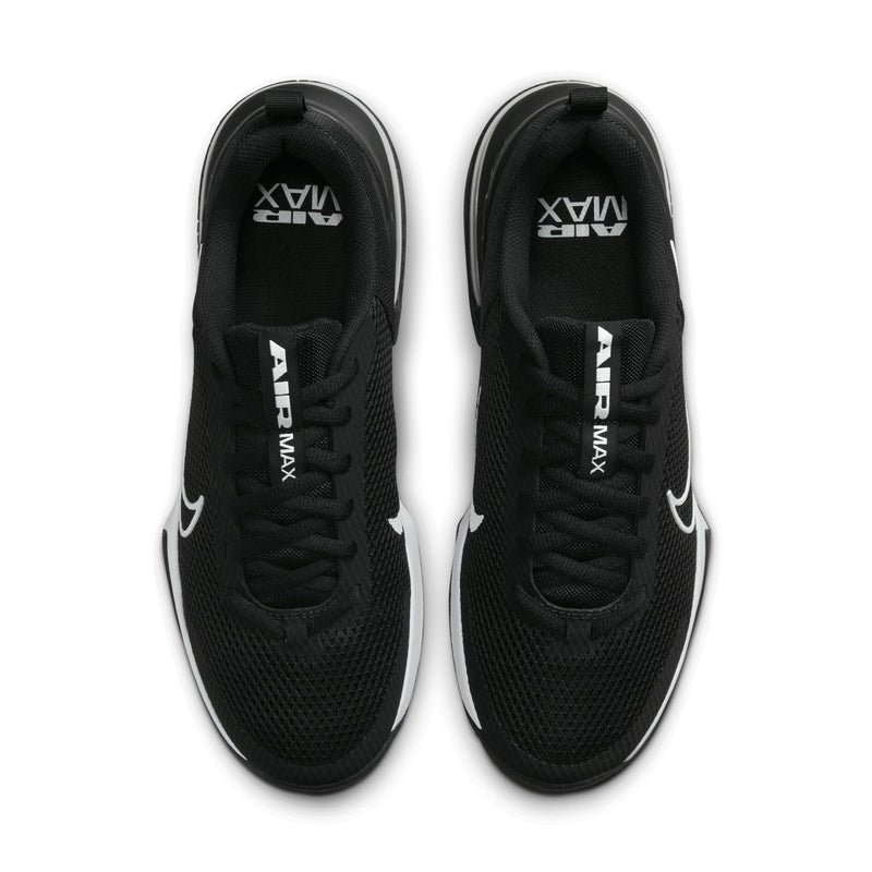 Pair of black mesh training sneakers with white Nike swoosh and laces