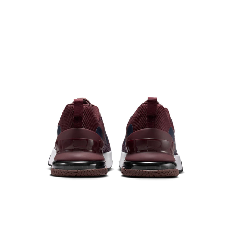 Pair of burgundy training sneakers with heel pull tabs, white midsole, visible air.