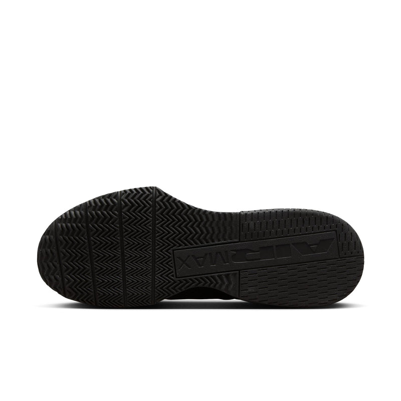 Black rubber outsole for men’s training shoes with deep tread pattern