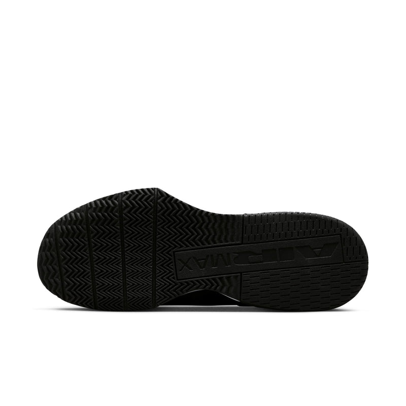 Black rubber outsole with patterned tread for traction on training sneakers