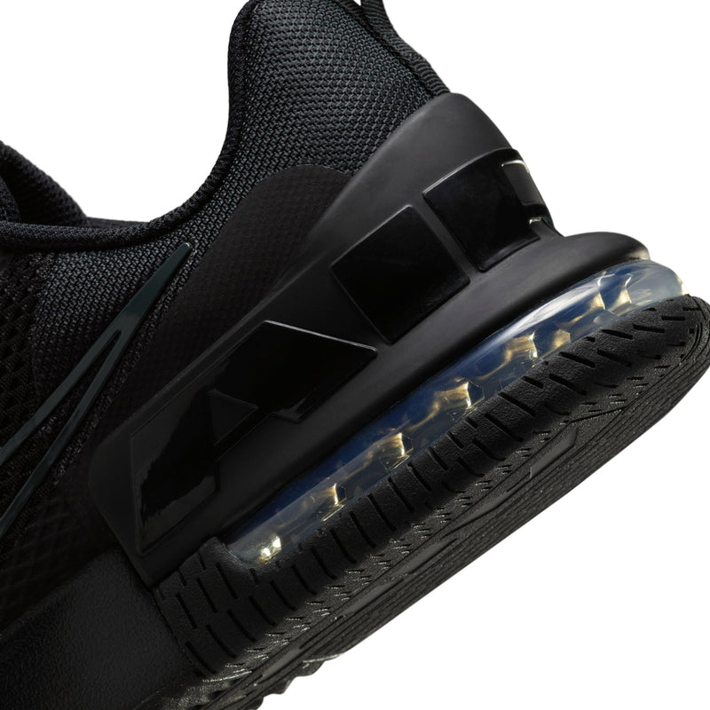 Black men’s training shoe heel with blue-tinted air unit and rubber side guard