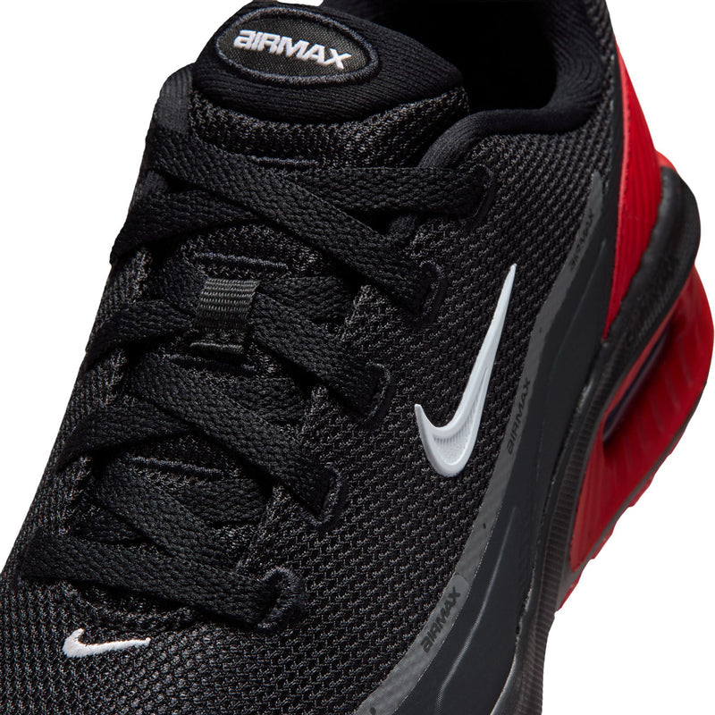 Close-up of youth sneaker tongue, black fabric with AIRMAX logo and black laces