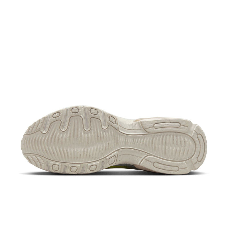Men's tan running shoe outsole with textured rubber traction tread