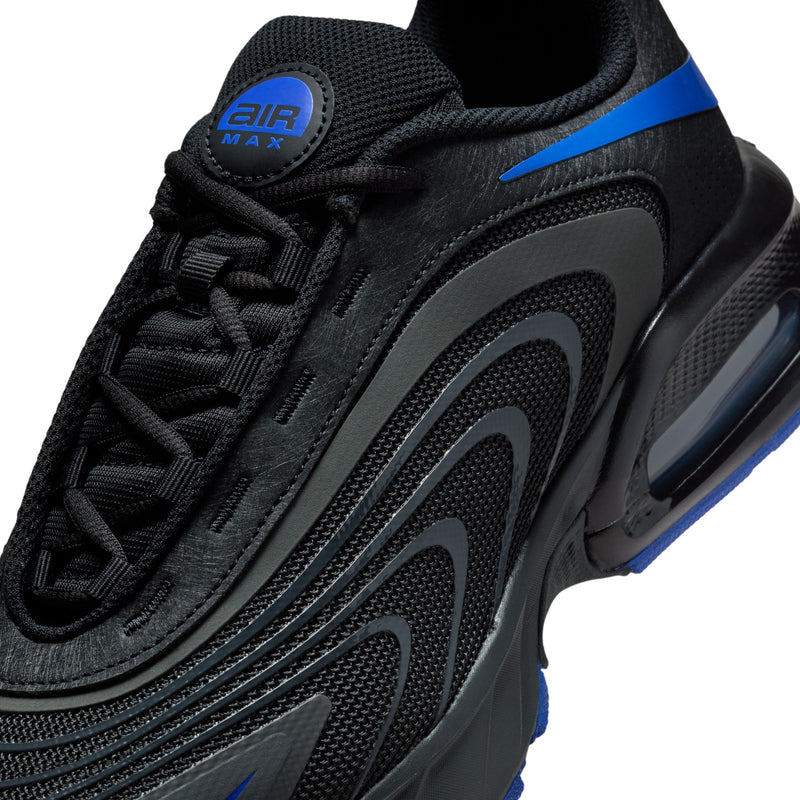 Air Max running sneakers close-up, black mesh upper with blue panel and lace detail