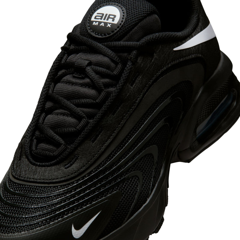 Men's black sneaker upper close-up with laces, Air Max badge, and Swoosh