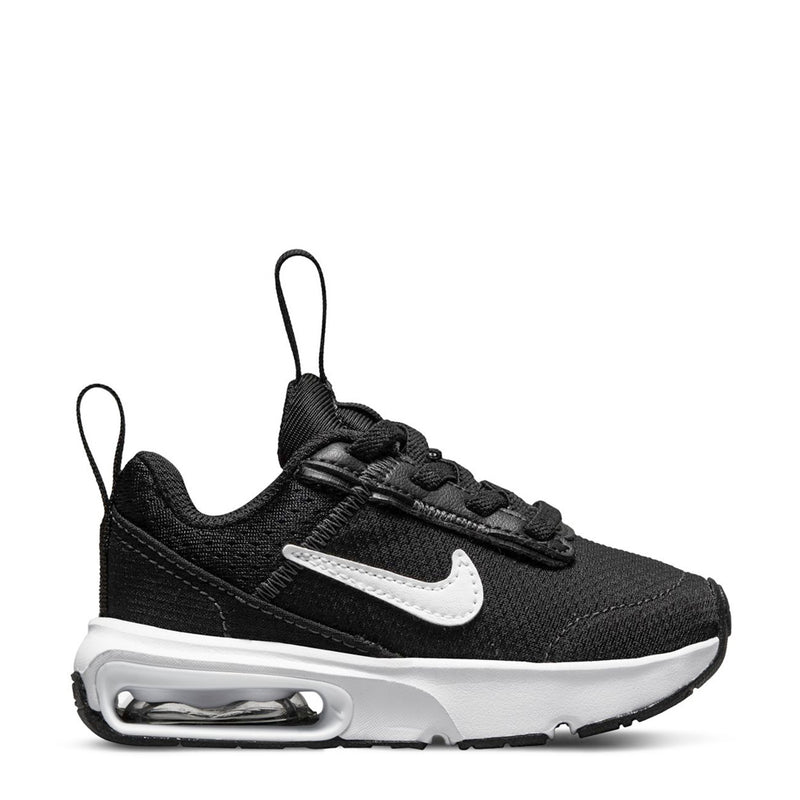 Black toddler sneakers with white Nike swoosh and visible Air Max cushioning in sole