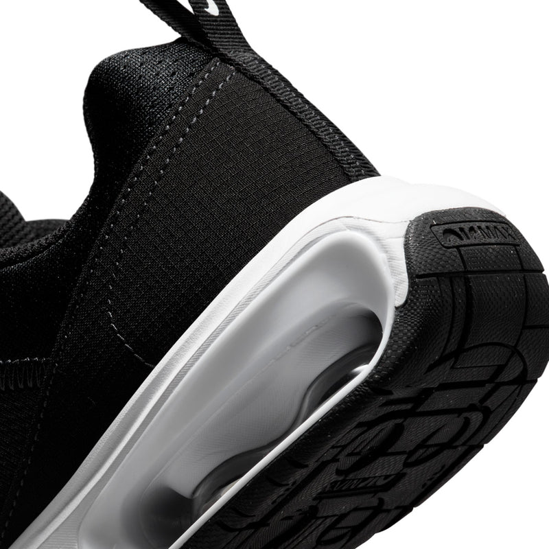 Youth Nike Air Max sneaker heel side, black rubber tread with visible Air unit in white
