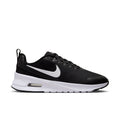 Black and white women's Nike sneakers with cushioned Air sole