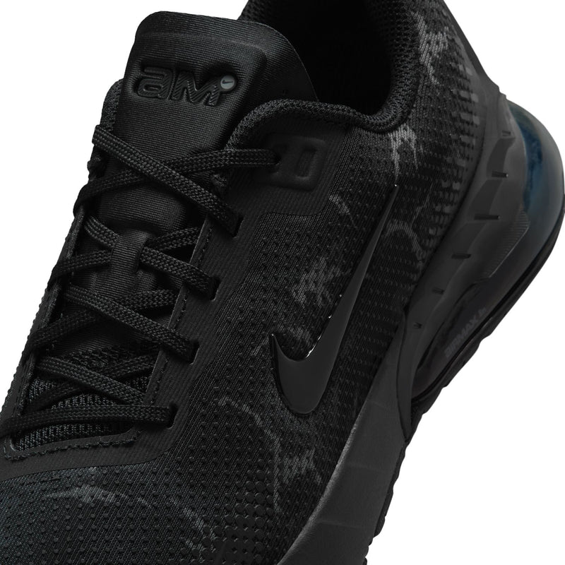 Youth Air Max Phoenix sneaker lace and tongue detail with black strap and branding.