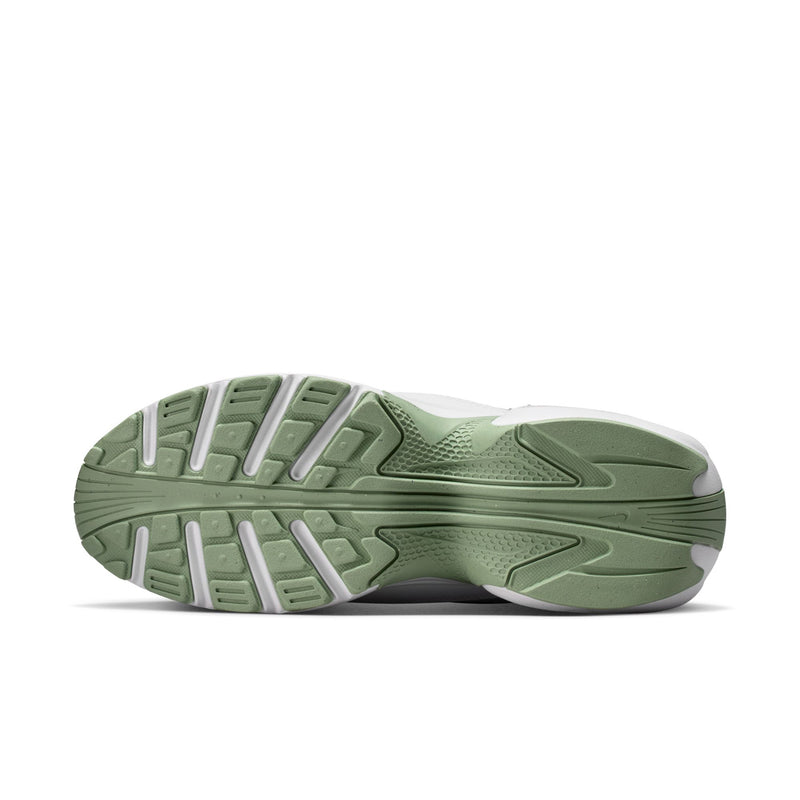 Mint green and white women's sneaker outsole with deep tread for grip