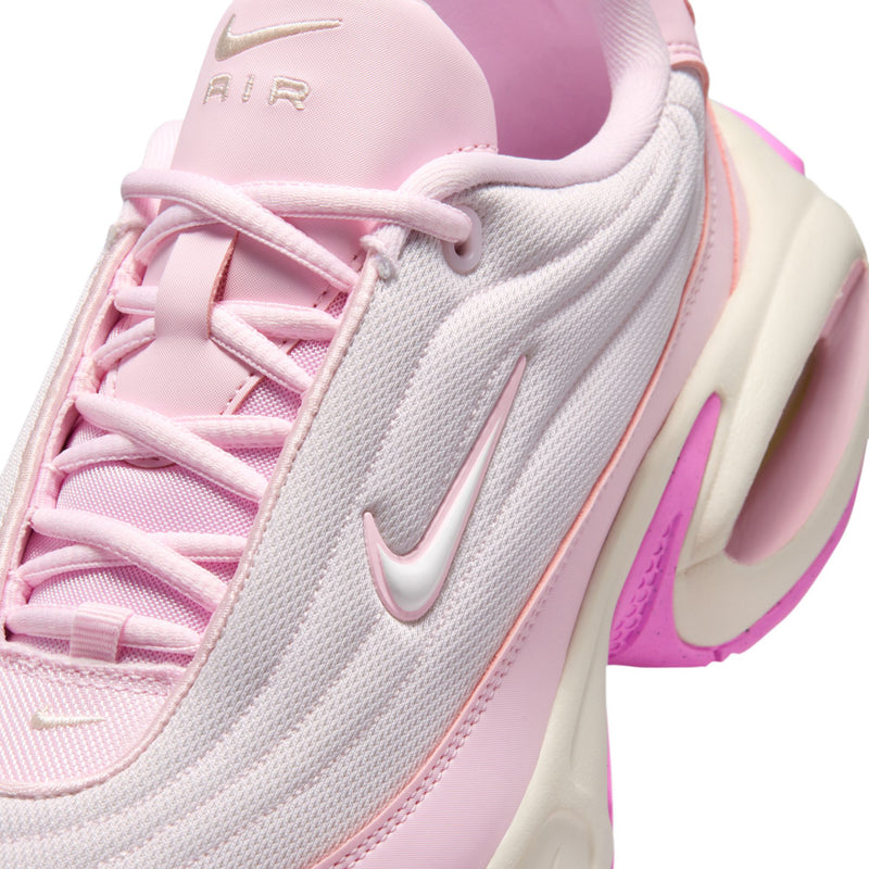 Close-up of women’s pearl pink and light gray lace-up upper with Nike Swoosh