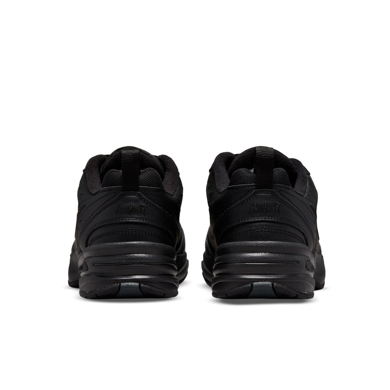 Pair of men's black sneakers, rear heel view with padded collar