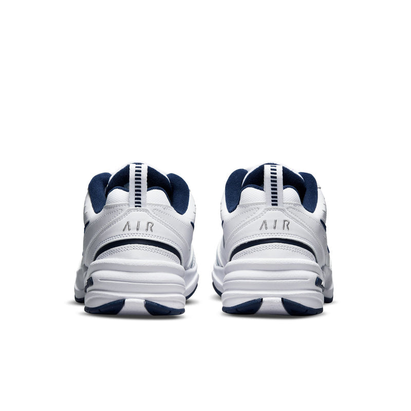 Men's white sneakers with navy heel tabs and stacked cushioned midsole